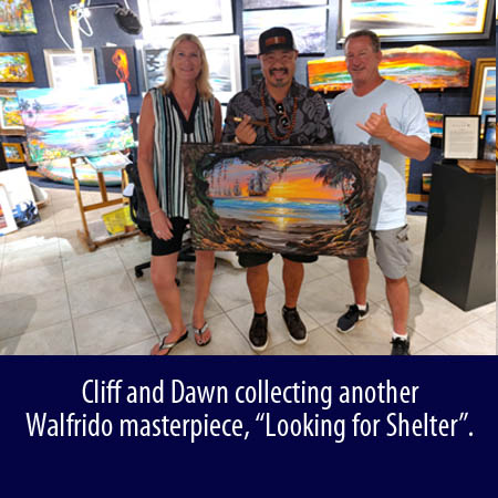 Cliff and Dawn with their new Walfrido artwork - Looking for Shelter at Wyland Gallery Sarasota
